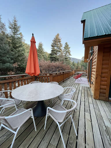 Wraparound deck with outdoor dining area