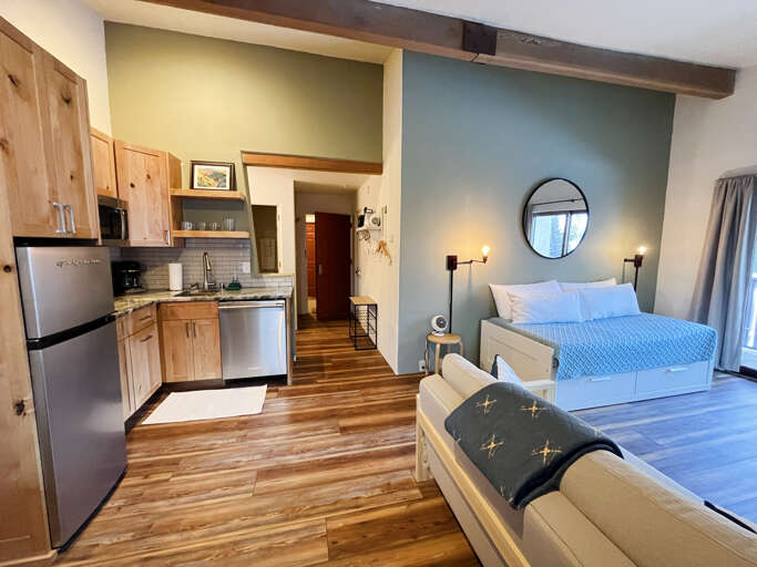 condo kitchen with granite counter tops