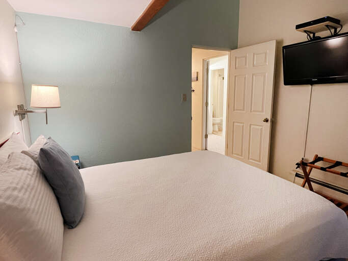 Queen bedroom exit to hall