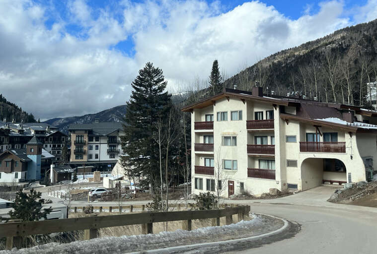 Winding down the road toward the Condo Complex