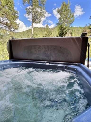 Hot tub with mountain backdrop