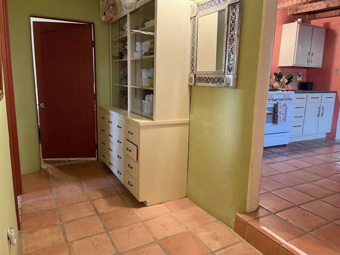 King Bedroom and Bathroom Hallway to Kitchen