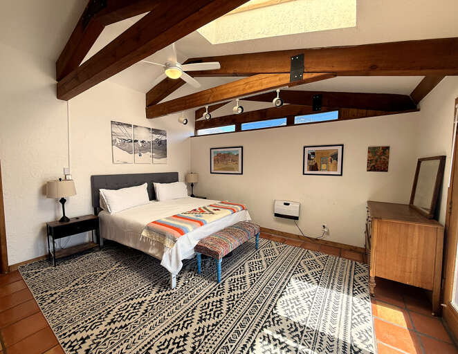 Comfortable and light-filled king bedroom