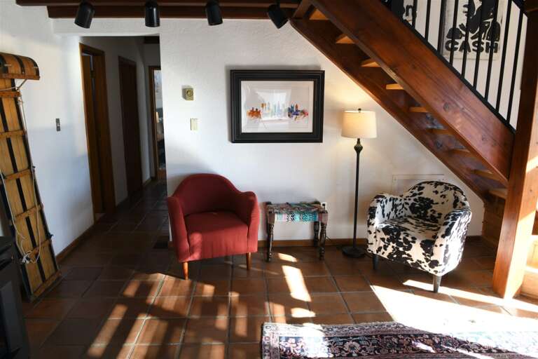 Cozy seating under the stairs