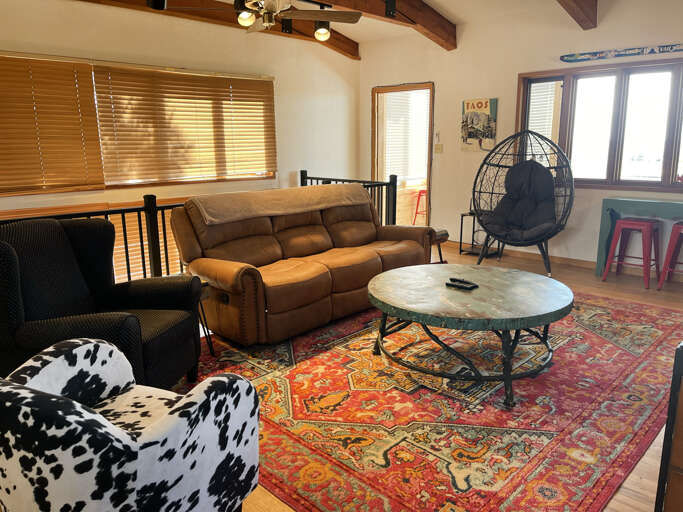 Relax in this cozy space with plush comfortable seating and big coffee table