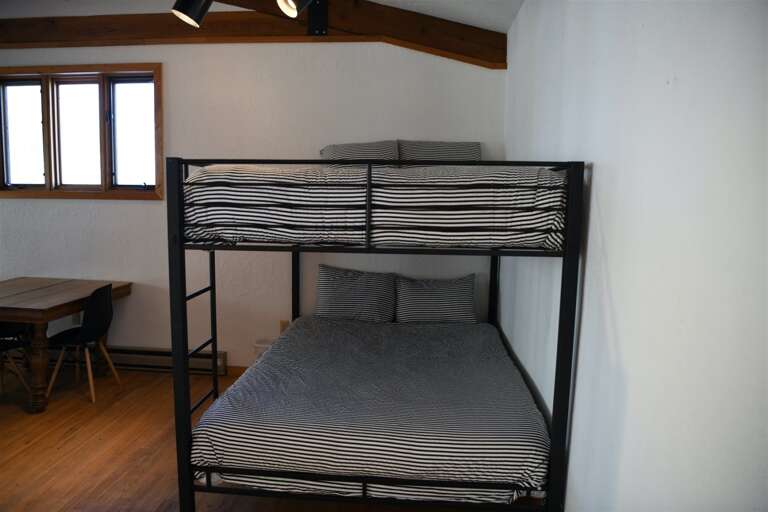 Queen over queen bunk in the loft