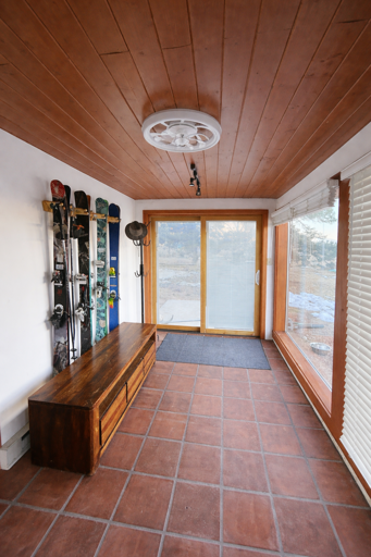 Plenty of space for boot and ski storage indoors in the entryway