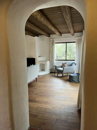 Arched doorway looking into living room