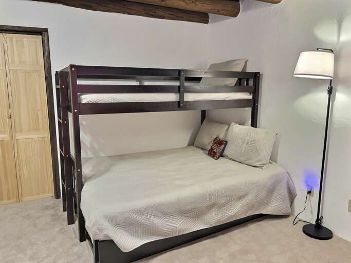Bunk room with pyramid bunk
