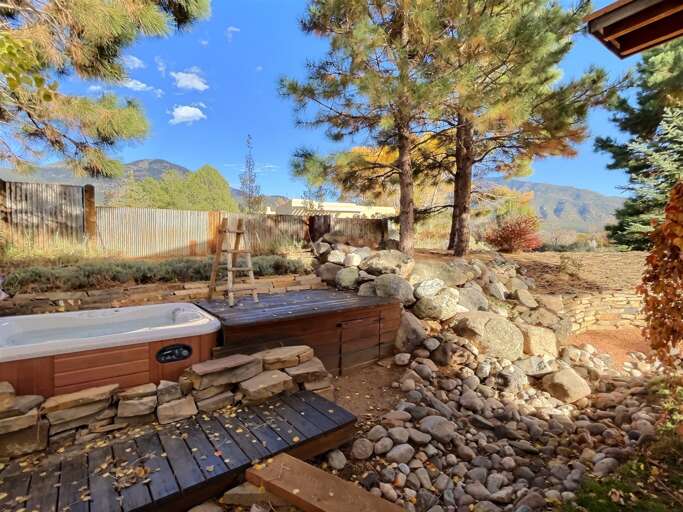 Hot tub built into the lanscape