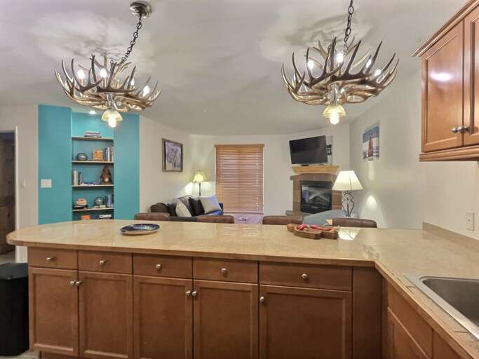 Comfortable fully stocked kitchen with island seating