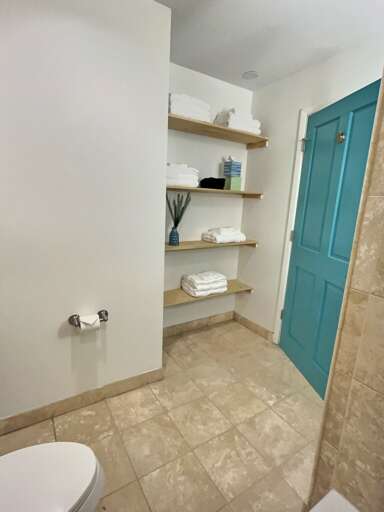 Main bathroom with storage