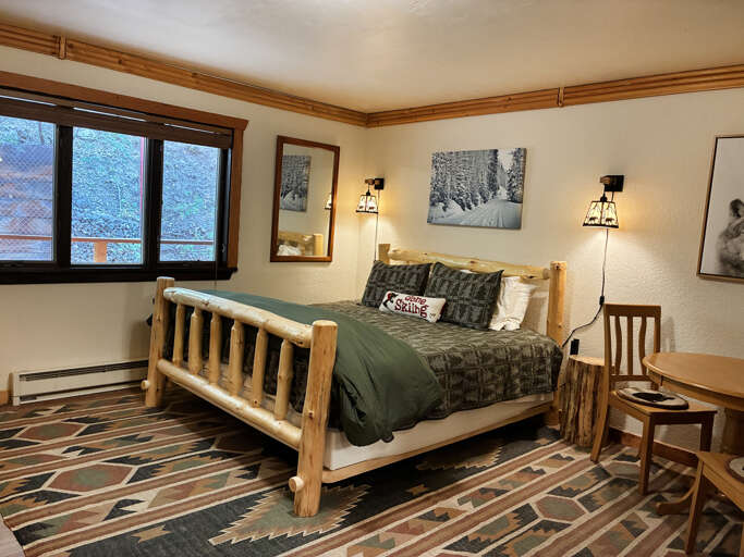 Comfortable private bedroom with private entry, king plush bed, cafe table, Smart TV
