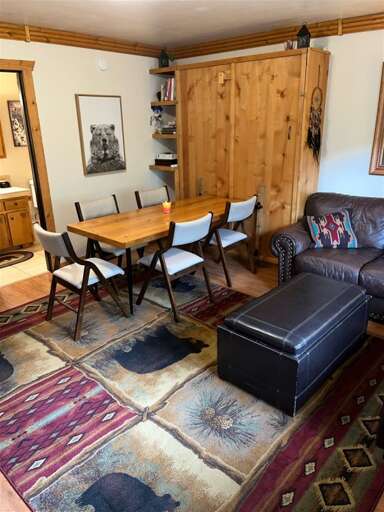 Living Area with Table and Chairs set for Dining
