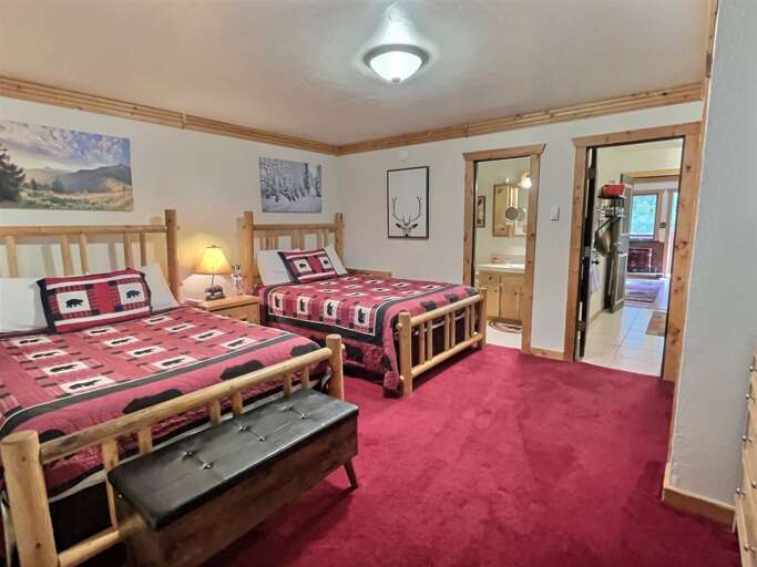 Two Queen Bedroom with passage to Kitchen