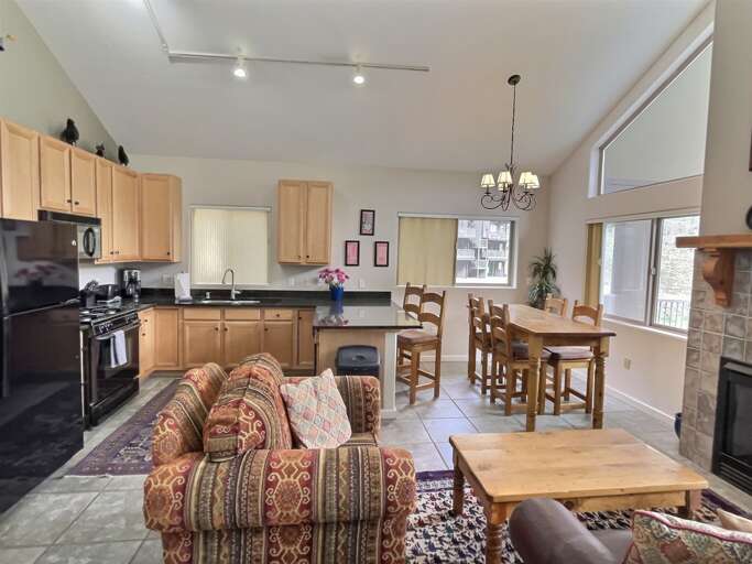 Dining, living and kitchen spaces