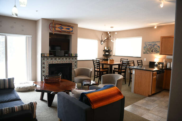 Fireplace in between living and dining areas