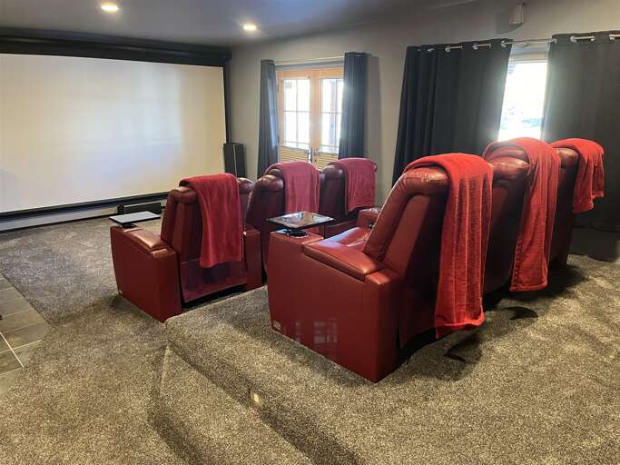 The cinema room will charm the entire group.