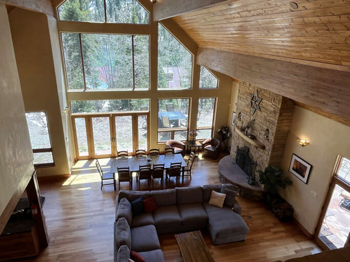 Cozy and open living and dining area with huge picture windows