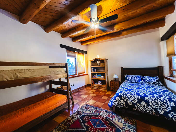 Relax in your cozy retreat with exposed beam ceilings and handcrafted charm, perfect for families or friends sharing memorable moments together.
