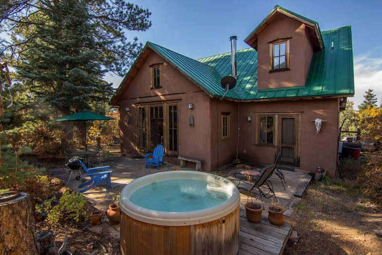 Hot Tub and deck in back of the home