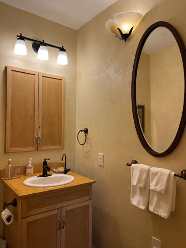 Hall half bath opposite guest queen bedroom