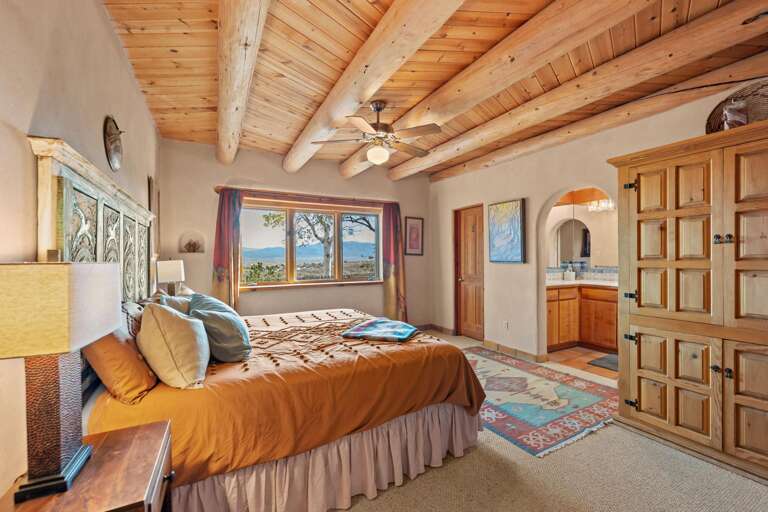 King bedroom with ensuite bath entry (yes there is a TV in the trostero)