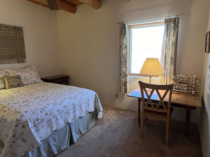 Guest bedroom with work desk