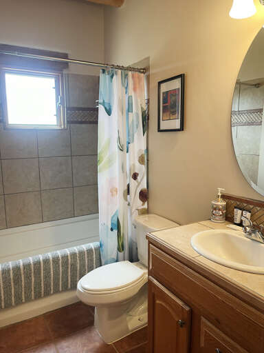 Hall full bathroom with shower tub combo
