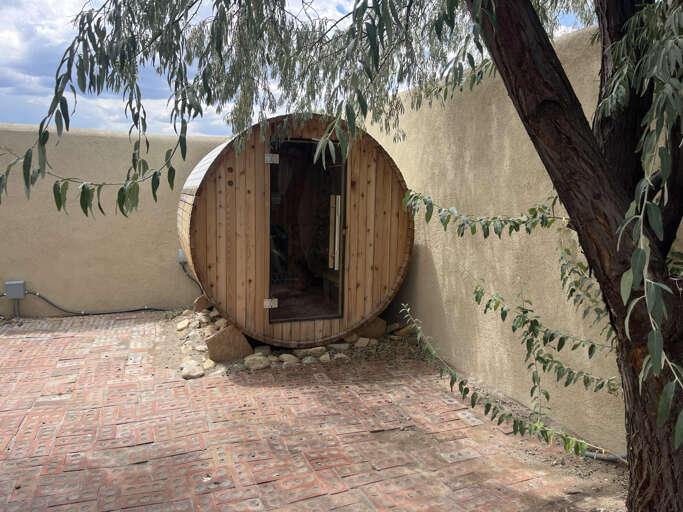 Sauna under a shade tree