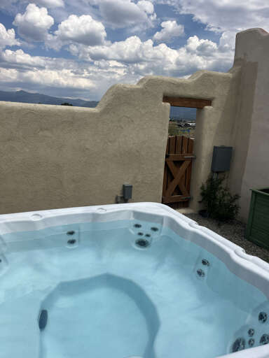 Back Patio hot tub with mountains