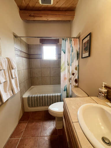 Hall full bathroom with shower tub combo