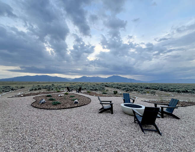 Back yard seating, gas fire pit and mountain view