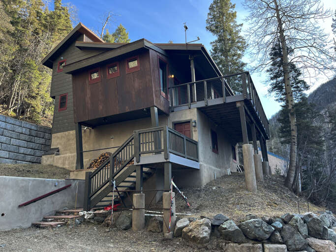 Exterior with stairs to entry