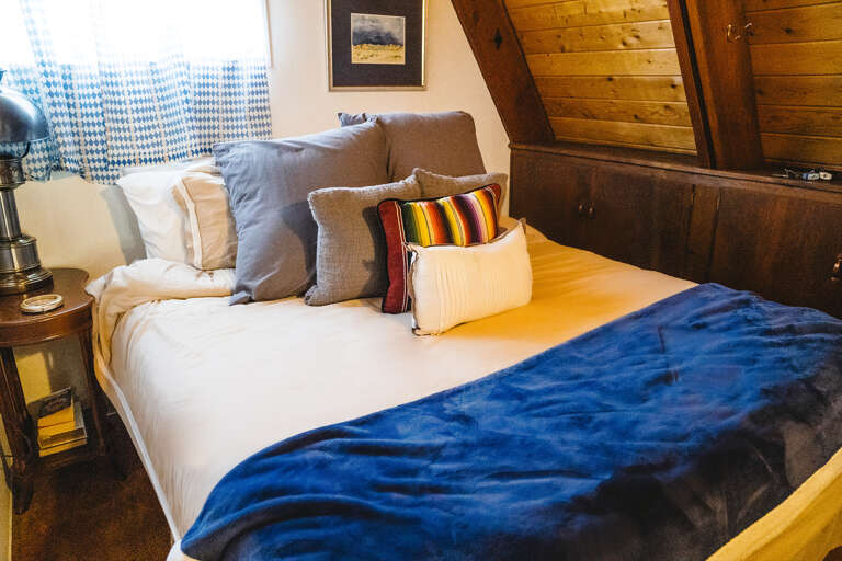 Main level second queen bedroom