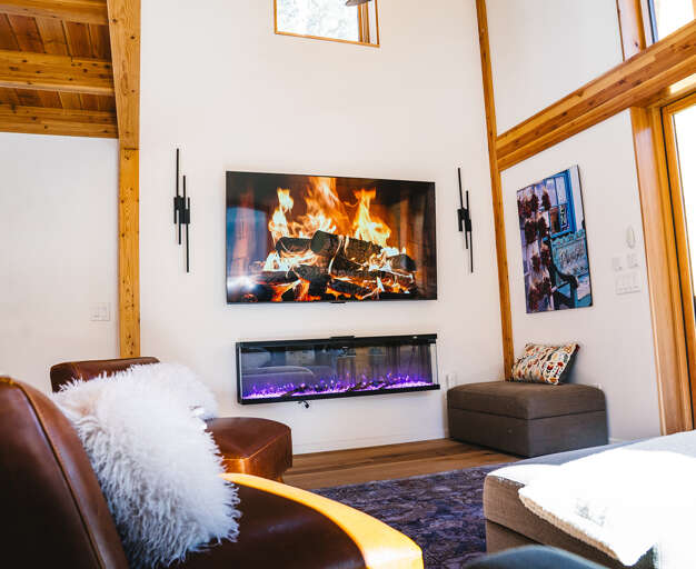 Flat screen TV and electric color changing fireplace