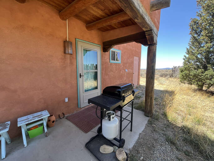 Fire up the BBQ on your private covered patio and savor outdoor dining with sweeping views of the natural landscape.