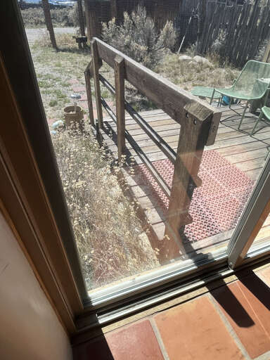 Step out onto your private deck where outdoor seating awaits among peaceful garden surroundings for morning coffee or evening relaxation.