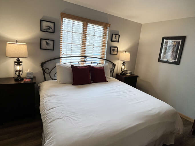 Sink into crisp white linens and plump pillows after a day of adventure. Warm lamps and elegant decor create your peaceful retreat.