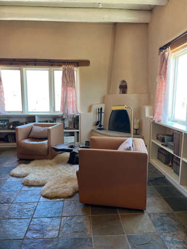 Bedroom seating area for privacy and relaxation away from the larger group