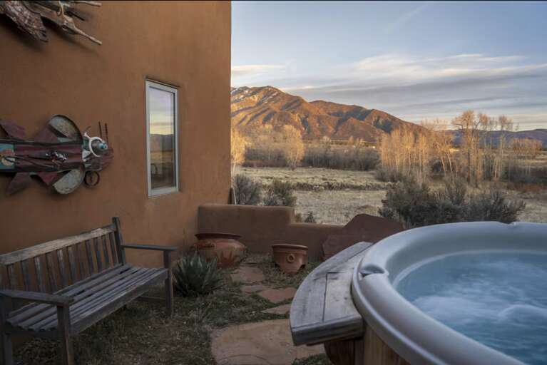 Unwind in your private hot tub while taking in sweeping mountain views and golden-hour light painting the natural landscapeâa perfect spot to relax after exploring the area.