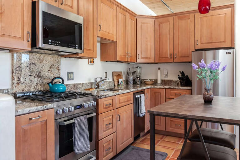 Step into your fully equipped kitchen with stainless appliances, gas range, and granite countersâeverything you need to whip up a delicious meal during your stay.