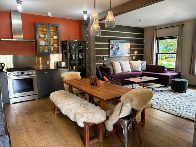 Your open-concept space blends comfort and style, with a fully equipped kitchen flowing into a cozy living area where natural light and modern touches invite you to unwind effortlessly.