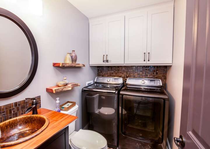 Powder Room on the Main Floor with Washer and Dryer