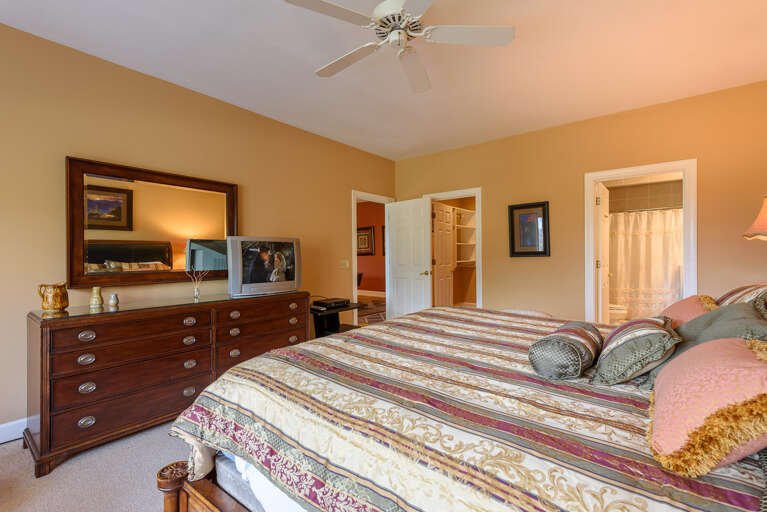 Downstairs Bedroom with King Bed, TV, Private Bathroom, Large Walk-In Closet
