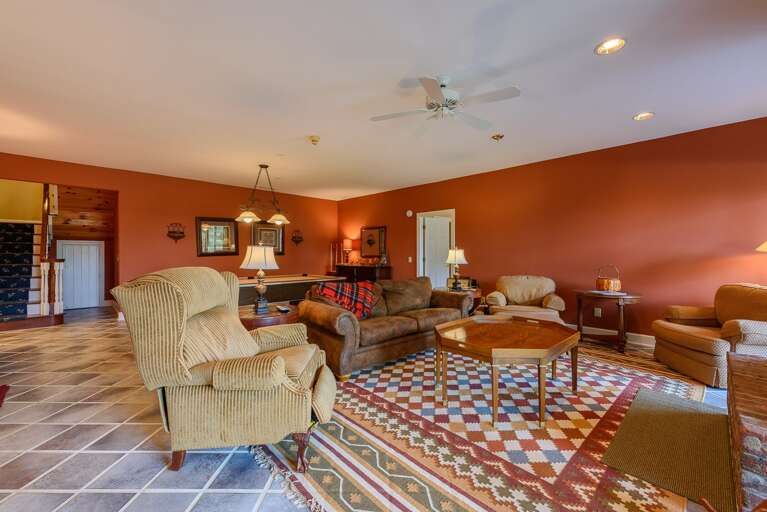 Lower Level Den with Pool Table, Wood-Burning Fireplace, TV, and Sleeper Sofa