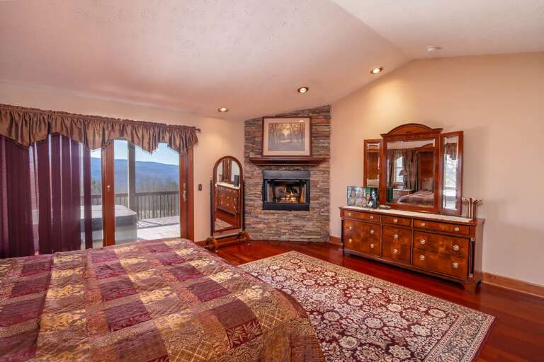 King Master Suite with Fireplace, and Access to Hot Tub/Porch King Master Suite with Fireplace, and Access to Hot Tub/Porch