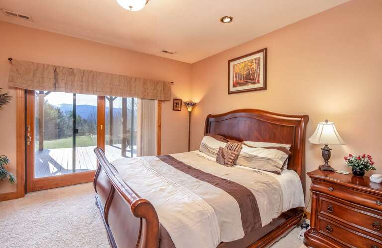 Lower Level King Bedroom with Patio Access Lower Level King Bedroom with Patio Access