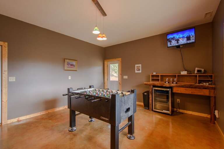 Game Room with Foosball Table and Flatscreen TV Game Room with Foosball Table and Flatscreen TV