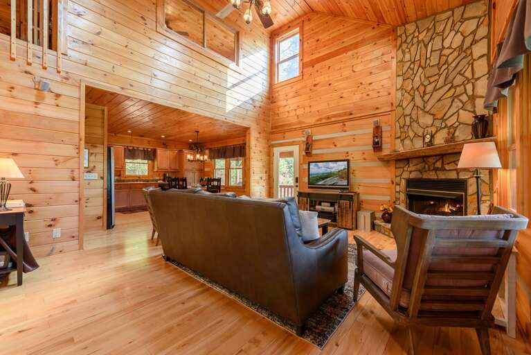 About Time Living Room with Stone Fireplace About Time Living Room with Stone Fireplace